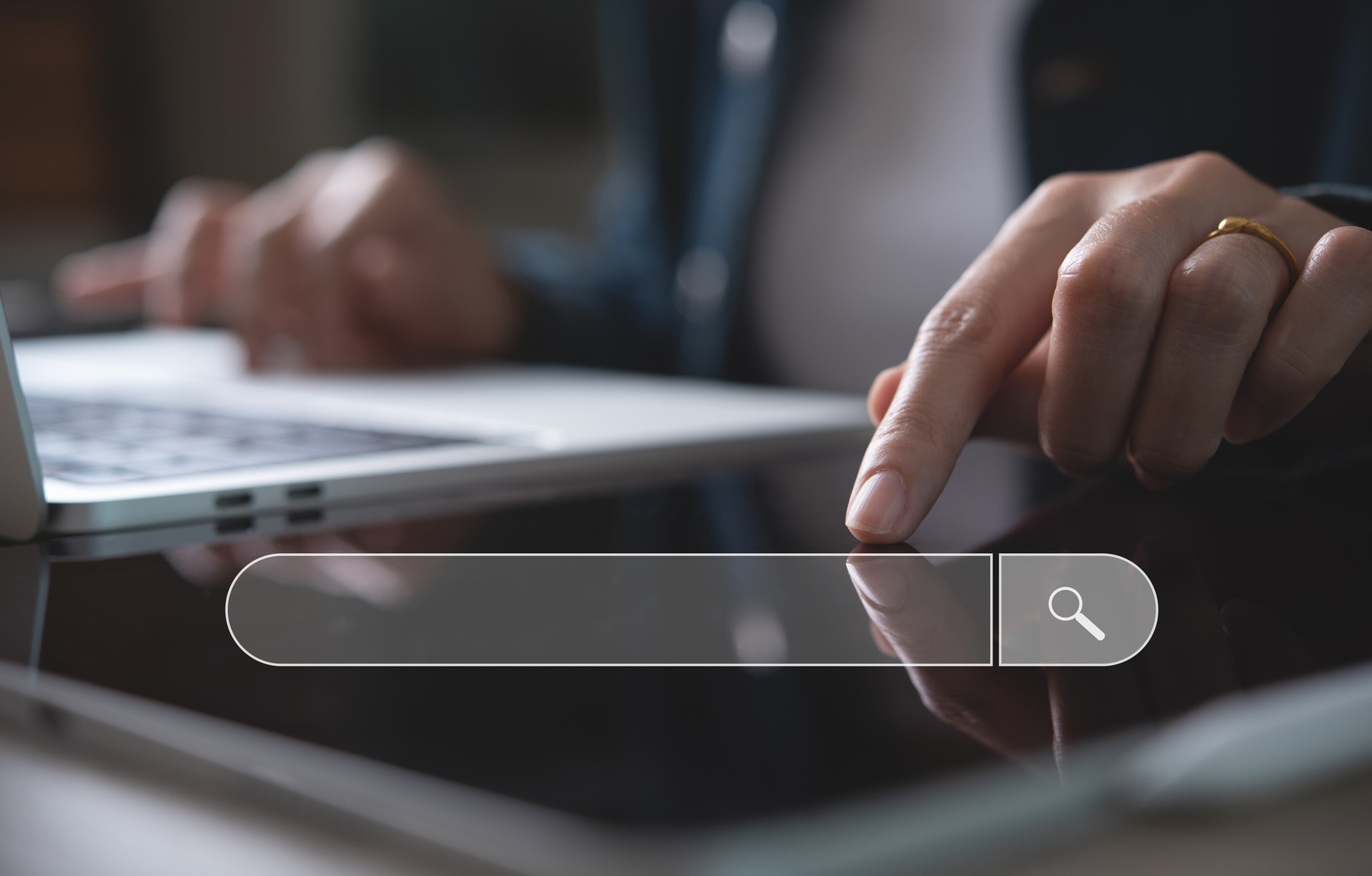 hand typing in search bar